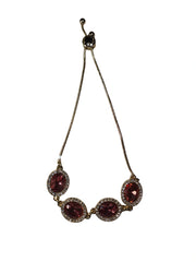 Necklace with red gemstones on a white background