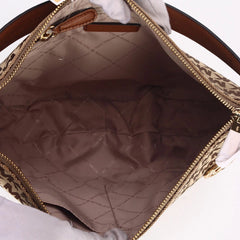 MICHAEL KORS Bedford Signature Medium Crescent Shoulder Bag in Brown and Tan with Gold Tone Hardware